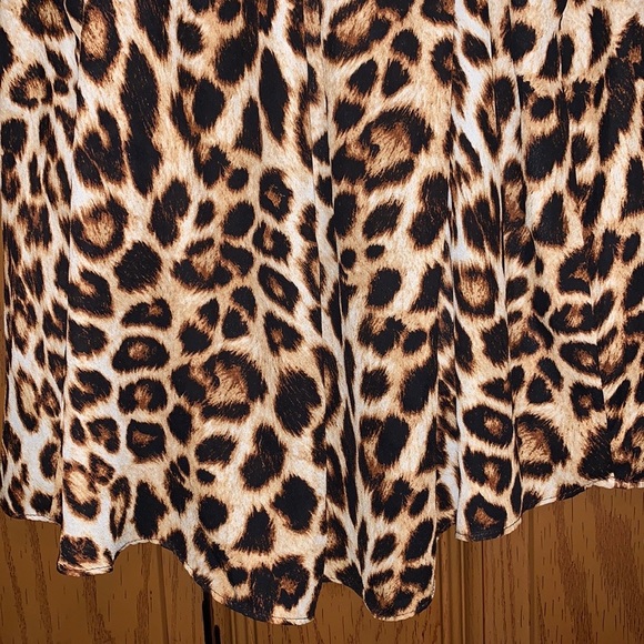 Everly Cheetah Leopard Print Flowy Peplum High Low V-Neck Sleeveless Blouse - Picture 14 of 16